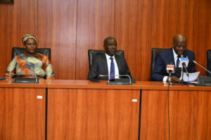 Aminu Maida, the EVC of Nigerian Communications Commission (Middle) and Cardoso Olayemi, the Governor the Central Bank (Right) of Nigeria during the signing of the MoU. Image source: NCC