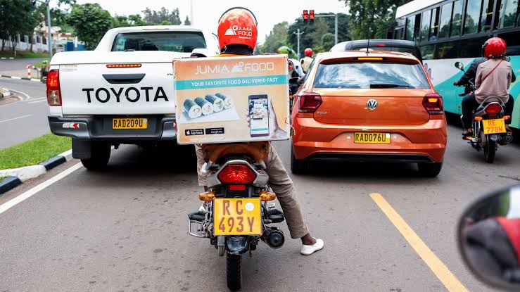Jumia courier navigating city traffic—logistics remains both Jumia's core strength and biggest cost center.. Source: Quartz