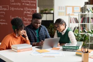 Nigerian students collaborating and studying. Source: mediaphotos / Getty Images